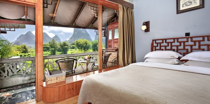 Yangshuo Mountain Retreat family private balcony overlooking the Yulong River.
