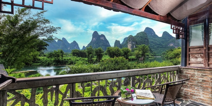 Yangshuo Mountain Retreat family private balcony overlooking the Yulong River.