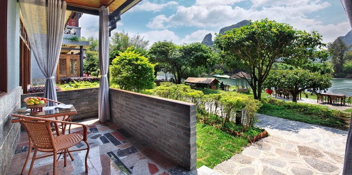 Spectacular views of the Yulong River from your oversized private balcony. The best of Yangshuo family acocmmodation.